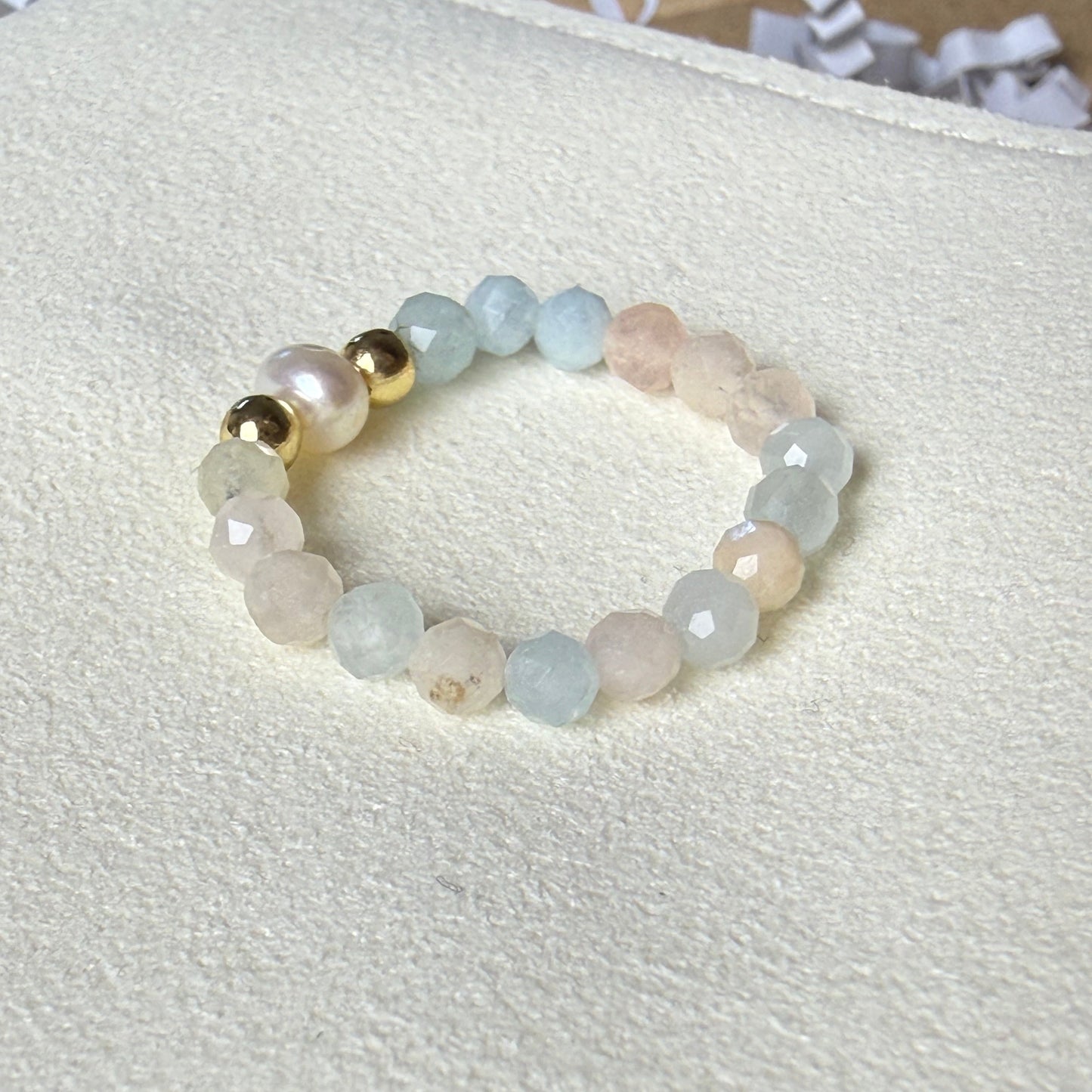Multicolour morganite and freshwater pearl stretch ring on cream suede – handmade pastel crystal ring by Manushaa Gems