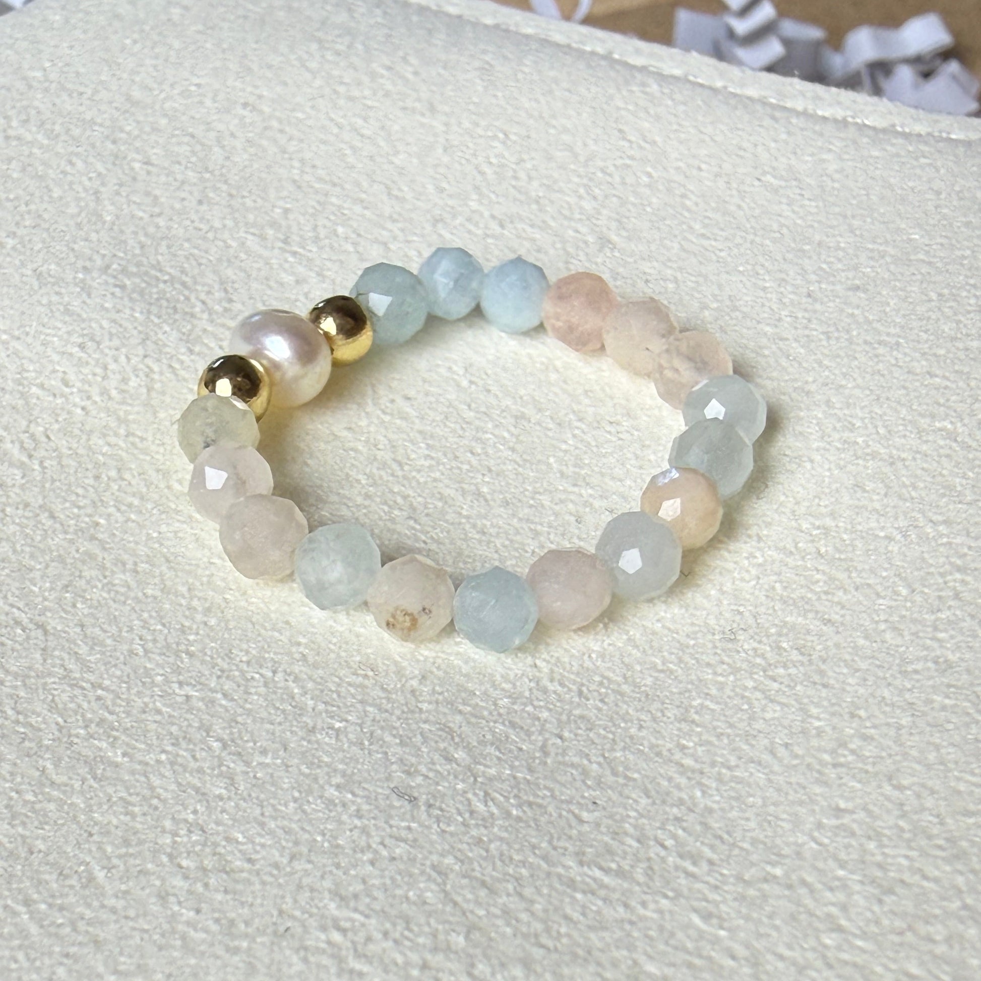 Multicolour morganite and freshwater pearl stretch ring on cream suede – handmade pastel crystal ring by Manushaa Gems
