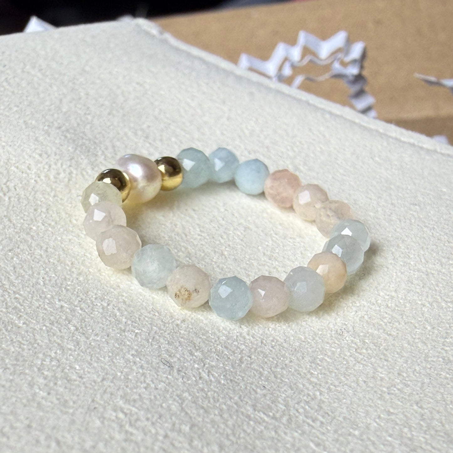 Macro detail of faceted multicolour morganite beads – handmade stretch ring by Manushaa Gems
