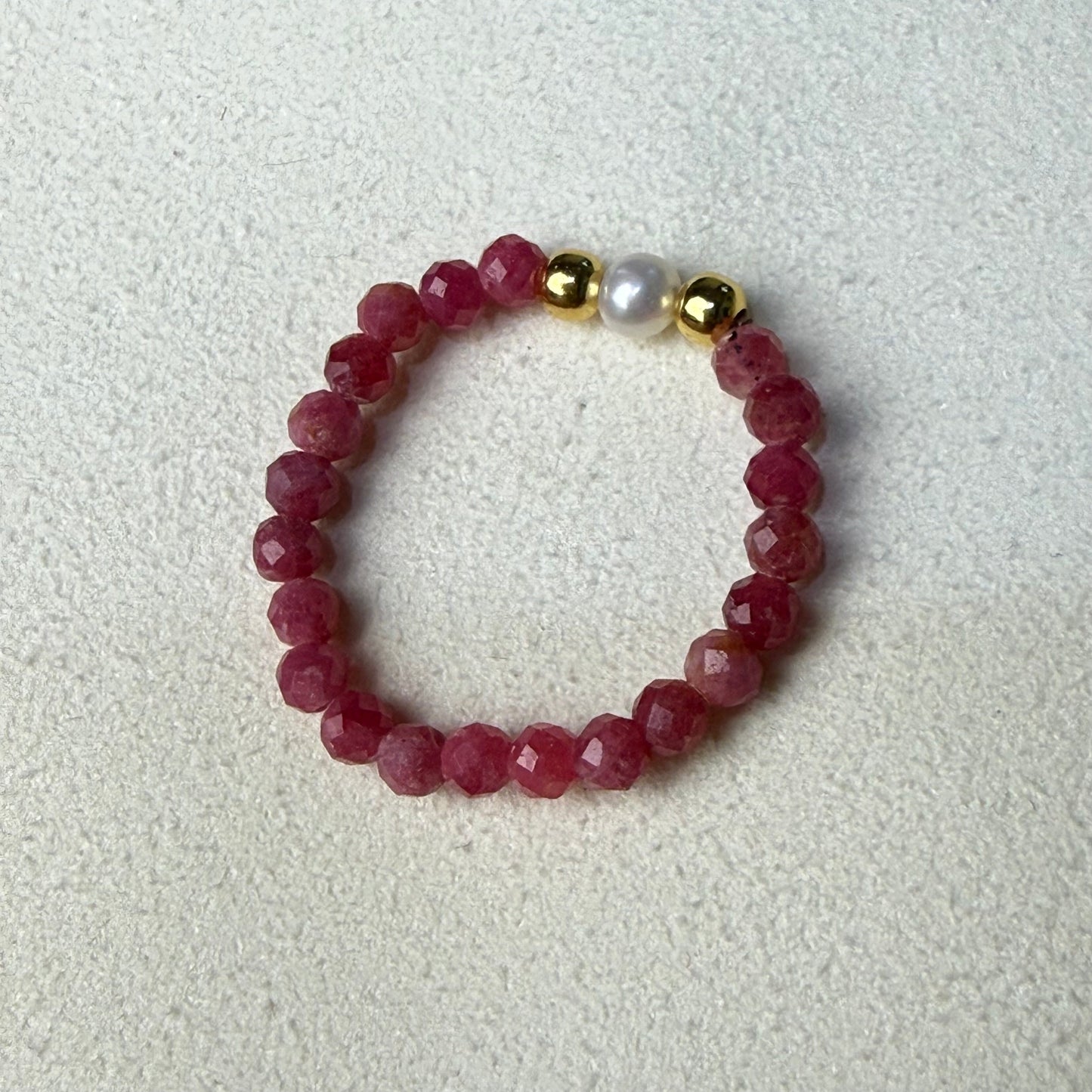 Rhodonite and freshwater pearl stretch ring on cream suede – handmade self-love crystal ring by Manushaa Gems
