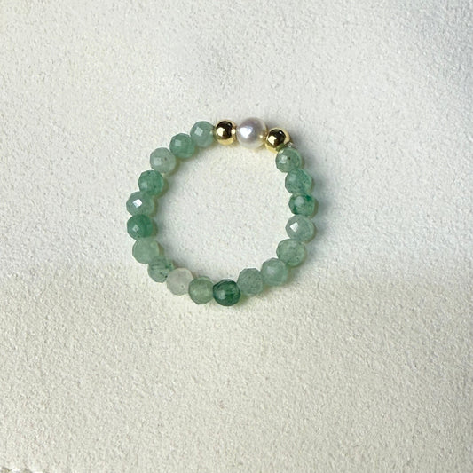 Green aventurine and freshwater pearl stretch ring on cream suede – handmade lucky crystal ring by Manushaa Gems