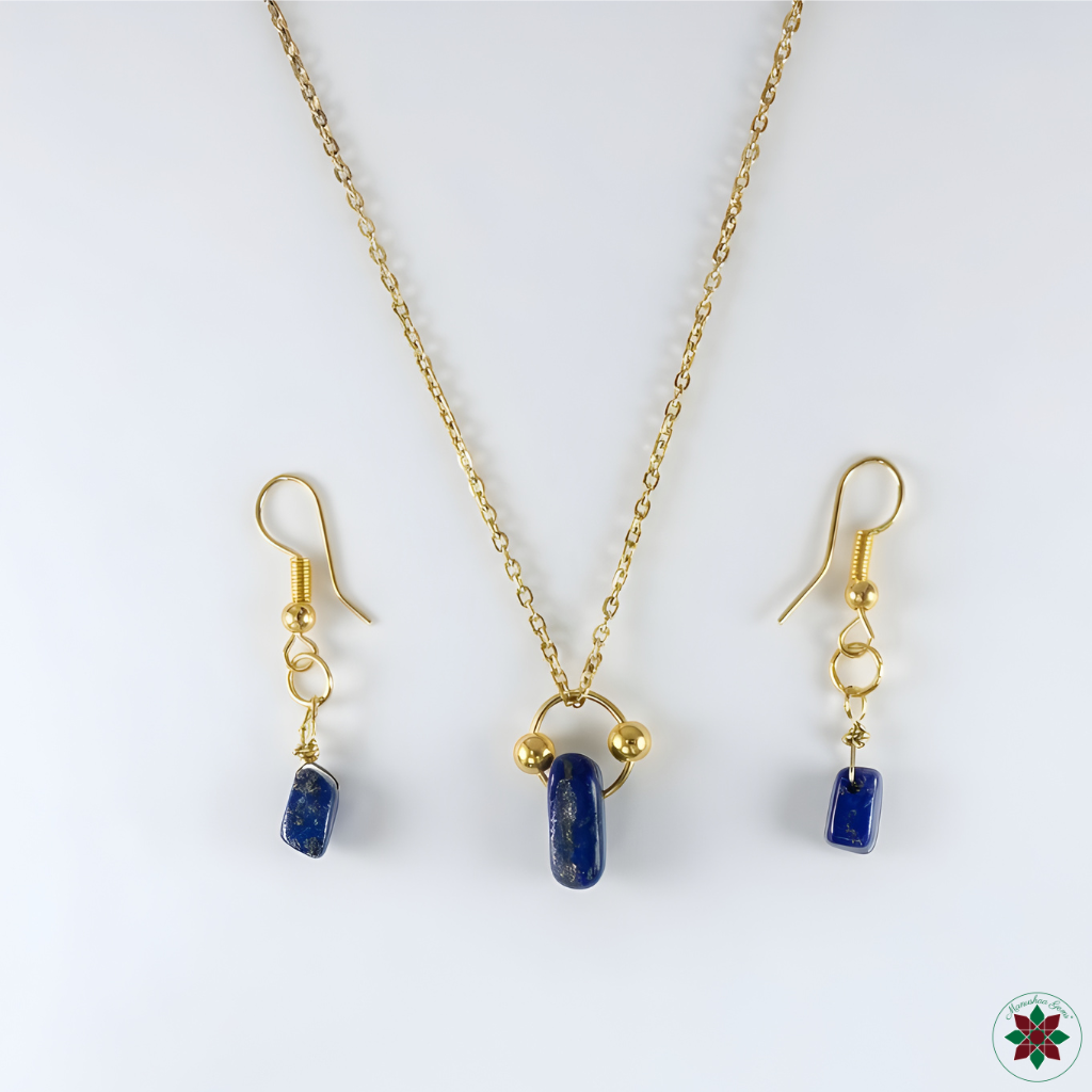 Lapis lazuli necklace and drop earrings flat lay on ivory — wisdom crystal jewellery set by Manushaa Gems