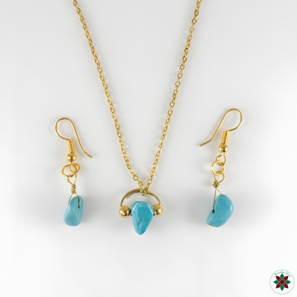 Turquoise necklace and drop earrings flat lay on ivory — healing crystal jewellery set by Manushaa Gems