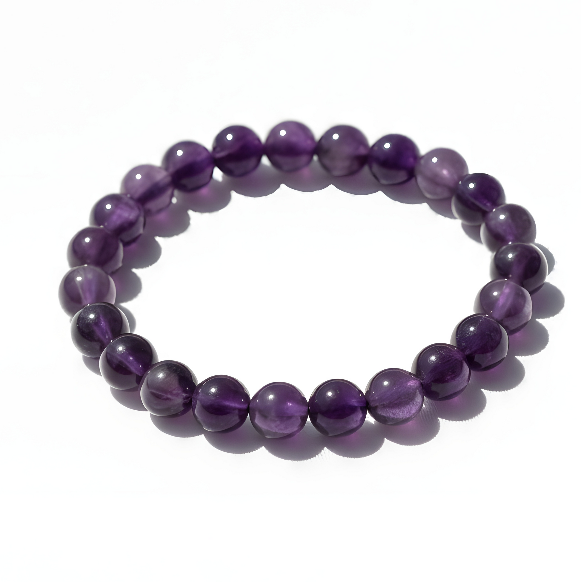 Amethyst handmade crystal bracelet with 8mm polished purple beads by Manushaa Gems
