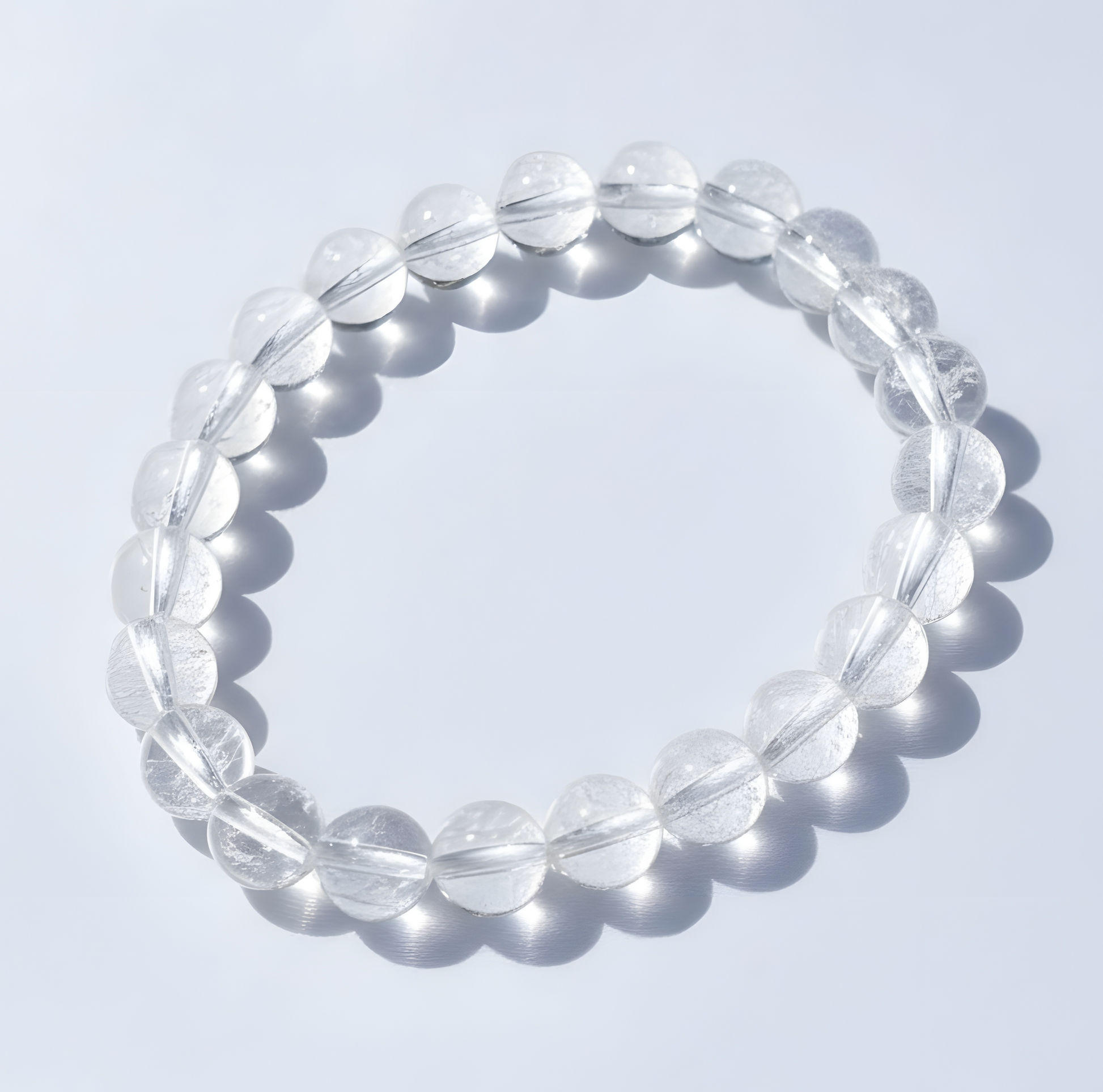 Clear quartz handmade crystal bracelet with 8mm polished clear beads by Manushaa Gems