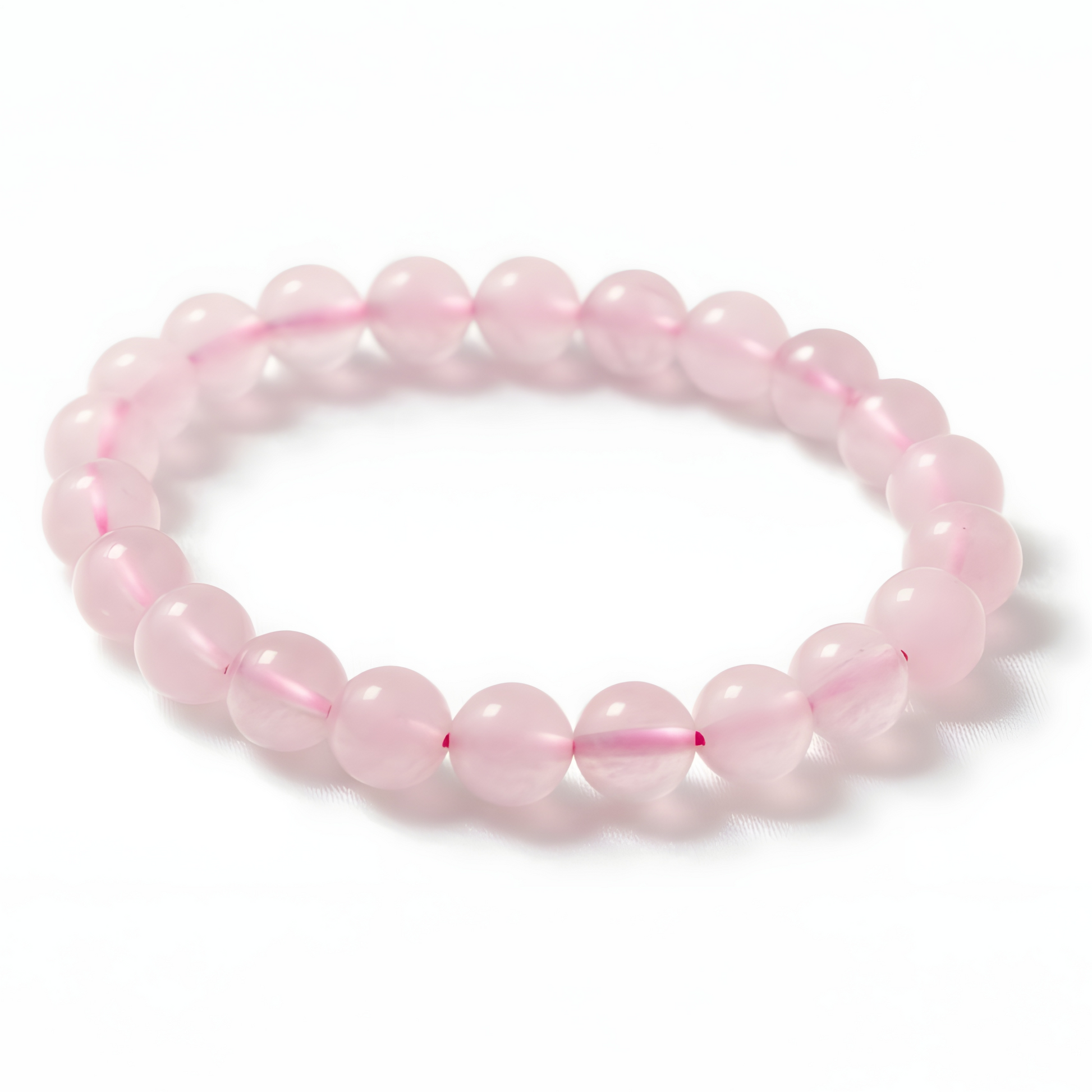 Rose quartz handmade crystal bracelet with 8mm polished pink beads by Manushaa Gems