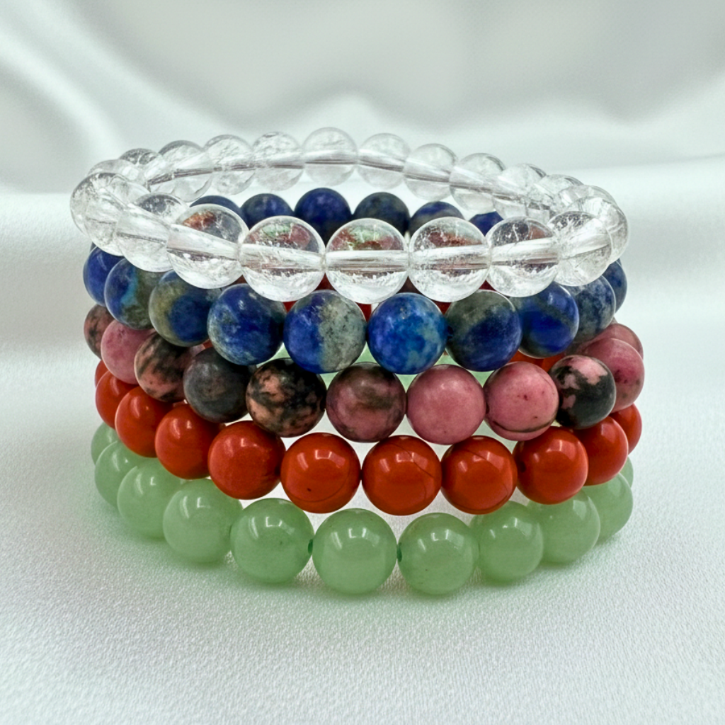 various crystal braceletrs with 8mm polished beads on white backgrouind