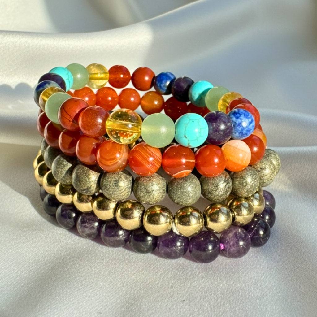 various crystal bracelet with 8mm polished beads on white background