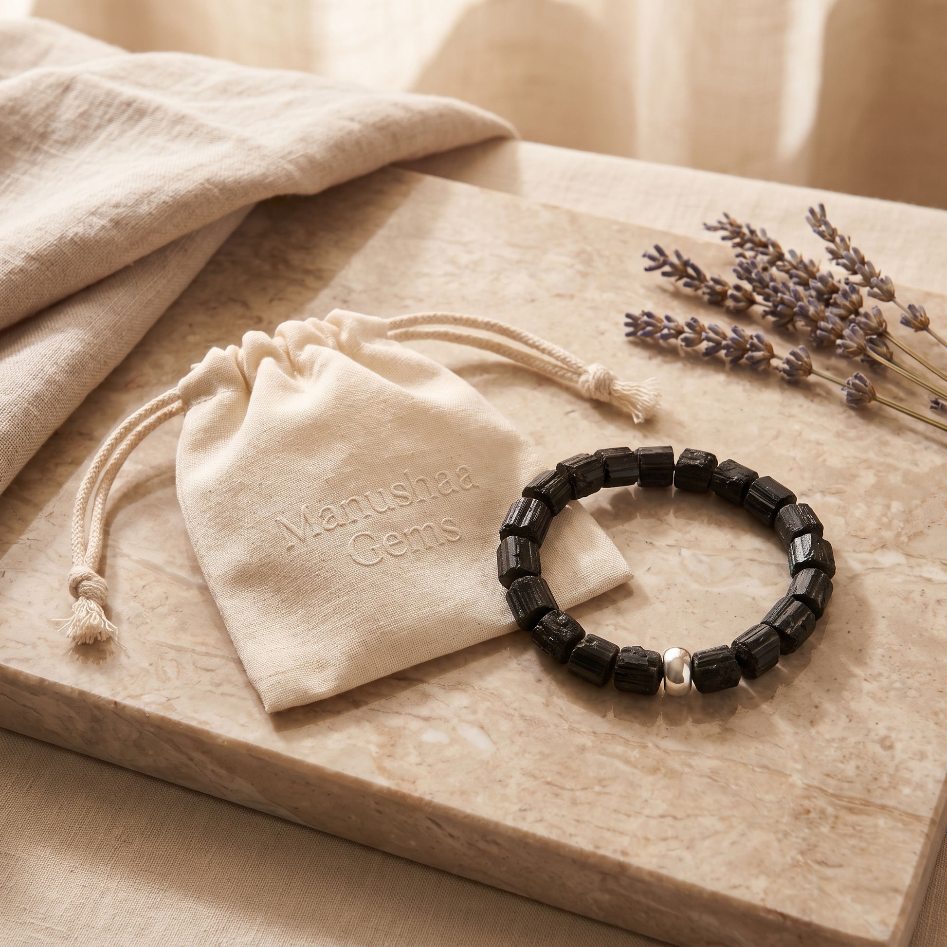Black Tourmaline crystal bracelet with Manushaa Gems branded gift pouch - ready to gift