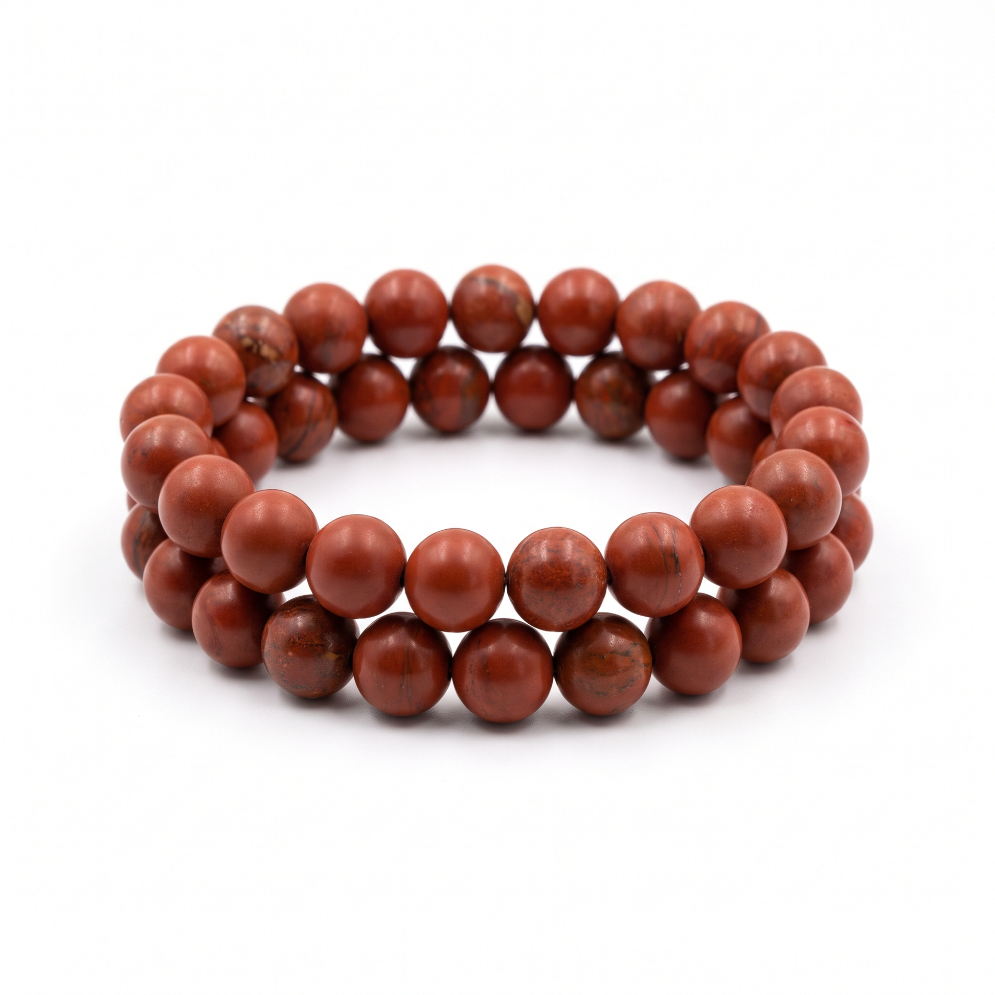 Natural Red Jasper 10mm crystal beaded stretch bracelet on white background - Manushaa Gems