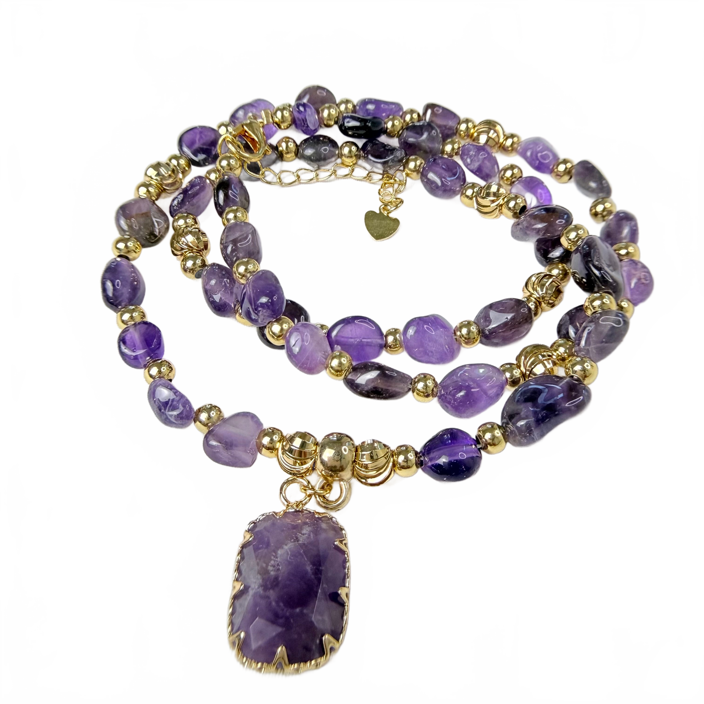 Natural amethyst beaded necklace with gold spacer beads and rectangular amethyst pendant, on a white background
