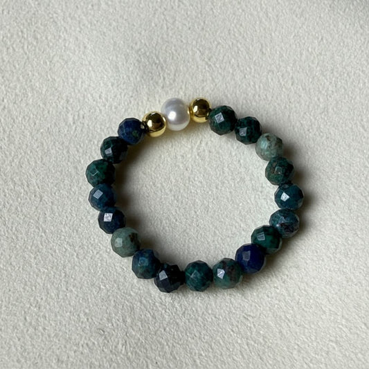 Close-up of teal blue-green faceted azurite beads with freshwater pearl and gold accents – Manushaa Gems